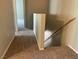 Upstairs hallway with carpet and a view into a bedroom at 9333 Leaping Deer Pl # 103, Las Vegas, NV 89178