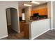 Stylish kitchen featuring modern cabinetry, stainless steel appliances, and an open layout connected to the living area at 9333 Leaping Deer Pl # 103, Las Vegas, NV 89178