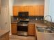 Well-equipped kitchen with stainless steel appliances, a stylish backsplash, and ample counter space for cooking at 9333 Leaping Deer Pl # 103, Las Vegas, NV 89178