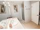 Simple bathroom featuring tile flooring, single vanity and step-in shower at 9552 Wooden Pier Way, Las Vegas, NV 89117