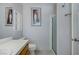 Bathroom featuring neutral walls, a glass shower door, and chrome fixtures at 9552 Wooden Pier Way, Las Vegas, NV 89117