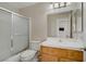 Bathroom with shower-tub combination and a wooden vanity at 9552 Wooden Pier Way, Las Vegas, NV 89117