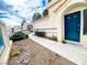 Inviting front entrance walkway and landscaping leading to the home's entrance at 9552 Wooden Pier Way, Las Vegas, NV 89117