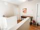 Hallway features hardwood floors, a small console table with decor, and multiple doors, creating a cozy atmosphere at 9552 Wooden Pier Way, Las Vegas, NV 89117