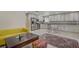 Open concept living space featuring a kitchen, dining area, and cozy seating at 9552 Wooden Pier Way, Las Vegas, NV 89117