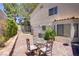 Charming patio with brick flooring, outdoor seating and view of the refreshing pool at 9552 Wooden Pier Way, Las Vegas, NV 89117