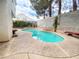 Inviting backyard pool features a lounge chair, and well-maintained surroundings, providing a relaxing outdoor oasis at 9552 Wooden Pier Way, Las Vegas, NV 89117