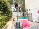 Inviting pool area includes a heater and surrounding greenery for an enjoyable outdoor experience in your own backyard at 9552 Wooden Pier Way, Las Vegas, NV 89117