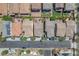 Bird's-eye view of residential neighborhood showcasing neatly arranged homes and manicured green spaces at 9872 Chief Sky St, Las Vegas, NV 89178