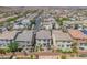 Neighborhood aerial view showcasing backyard patios, homes, landscaping, and community streets at 9872 Chief Sky St, Las Vegas, NV 89178