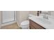 Cozy bathroom featuring a toilet, vanity with a sink, and a walk-in shower, providing essential amenities at 9872 Chief Sky St, Las Vegas, NV 89178