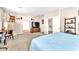 Spacious bedroom with walk-in closet, carpet flooring, and a door to a hallway at 9872 Chief Sky St, Las Vegas, NV 89178