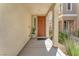 A welcoming front porch with an inviting entryway and tasteful landscaping at 9872 Chief Sky St, Las Vegas, NV 89178