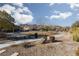 A community park featuring walking paths, seating areas, and lush landscaping at 1015 Solana Crest St, Henderson, NV 89052