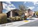 Inviting single-Gathering home with stone facade, drought tolerant shrubs, and an attached garage at 1015 Solana Crest St, Henderson, NV 89052