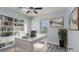 Bright home office with built-in shelves, desk, and a serene workspace at 1015 Solana Crest St, Henderson, NV 89052