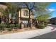 Charming two-story home boasts a well-manicured front yard and welcoming curb appeal at 10370 Sweet Laurel St St, Las Vegas, NV 89178