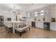 Modern kitchen featuring a center island, bar seating, and stainless steel appliances at 10370 Sweet Laurel St St, Las Vegas, NV 89178