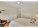 Charming bedroom showcases a closet, plush bed, ample natural light, and white accents at 10532 Sea Palms Ave, Las Vegas, NV 89134