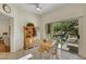 Cozy breakfast nook with sliding glass doors leading to the patio at 10532 Sea Palms Ave, Las Vegas, NV 89134