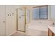 Bathroom featuring a glass-enclosed shower and a separate soaking tub at 10667 Casa Bianca St, Las Vegas, NV 89141