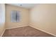 Bedroom featuring neutral walls and carpeted floors at 10667 Casa Bianca St, Las Vegas, NV 89141