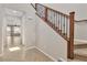 Hallway featuring stairwell with decorative iron and wood bannister at 11014 Great Sioux Rd, Las Vegas, NV 89179
