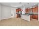 Bright and modern kitchen with granite countertops, stainless steel appliances, and tile flooring at 11014 Great Sioux Rd, Las Vegas, NV 89179