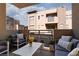 Relaxing private balcony with stylish seating, perfect for enjoying the outdoors at 11256 Rainbow Peak Ave # 202, Las Vegas, NV 89135