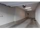 Spacious garage with overhead lighting provides ample room for vehicle storage and other items at 11256 Rainbow Peak Ave # 202, Las Vegas, NV 89135