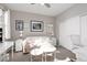 Cozy living room featuring a sofa, desk, and decor, creating a comfortable and stylish living space at 11256 Rainbow Peak Ave # 202, Las Vegas, NV 89135