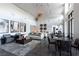 Bright lounge featuring modern decor, stylish furniture, and ample natural light with large windows at 11256 Rainbow Peak Ave # 202, Las Vegas, NV 89135