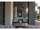 Stylish outdoor seating area with comfortable couches and chairs, perfect for relaxing at 11256 Rainbow Peak Ave # 202, Las Vegas, NV 89135