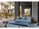 Inviting outdoor patio with ample seating and views of the community at 11256 Rainbow Peak Ave # 202, Las Vegas, NV 89135