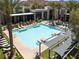 Resort-style pool area with comfortable lounge seating and a spa at 11256 Rainbow Peak Ave # 202, Las Vegas, NV 89135