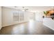 Bright living room featuring tile floors, recessed lighting, and sliding glass doors to the backyard at 1180 Via Vinci, Henderson, NV 89052