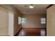 Open living room with hardwood floors and a ceiling fan at 1211 Silver Knoll Ave, Las Vegas, NV 89123