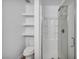 This bathroom features a new shower, built in shelves, and modern toilet at 1424 Santa Anita Dr # D, Las Vegas, NV 89119