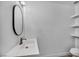 Modern bathroom featuring a sleek vanity and decorative wall shelving at 1424 Santa Anita Dr # D, Las Vegas, NV 89119