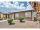 Charming single story home with desert landscaping and mature shrubs at 1424 Santa Anita Dr # D, Las Vegas, NV 89119