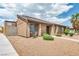 Charming single-story home with well-maintained desert landscaping and brick accents at 1424 Santa Anita Dr # D, Las Vegas, NV 89119