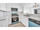 Bright kitchen features new appliances, marble countertops, and white cabinets at 1424 Santa Anita Dr # D, Las Vegas, NV 89119