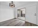 Open floor plan featuring modern flooring, leading to a balcony with lots of light at 1424 Santa Anita Dr # D, Las Vegas, NV 89119