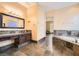 Bathroom featuring a vanity and separate bathtub at 151 Cliff Valley Dr, Las Vegas, NV 89148