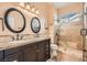 Bathroom featuring dual mirrors and a glass shower at 151 Cliff Valley Dr, Las Vegas, NV 89148