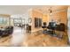 Home office space featuring travertine floors and natural lighting at 151 Cliff Valley Dr, Las Vegas, NV 89148