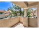 Relaxing outdoor balcony featuring a column with community views and greenery at 1557 Lake Placid Ter # 1557, Henderson, NV 89014