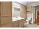 Bathroom features vanity, toilet and built in cabinet at 1557 Lake Placid Ter # 1557, Henderson, NV 89014