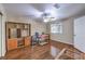 Spacious bedroom with wood floors, a ceiling fan and a large window at 1557 Lake Placid Ter # 1557, Henderson, NV 89014