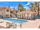 Community pool and lounge area with seating and shade for relaxing afternoons at 1557 Lake Placid Ter # 1557, Henderson, NV 89014